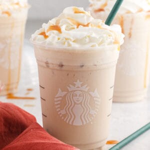square image of a copycat starbucks caramel frappuccino with a green straw