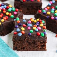 cosmic brownies arranged on a platter with recipe name at the bottom