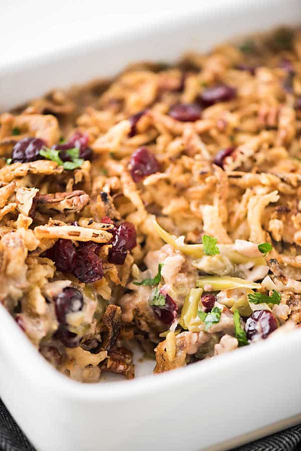 Cranberry Pecan Green Bean Casserole is an easy holiday recipe. It's a fun twist on classic green bean casserole and comes together in no time!