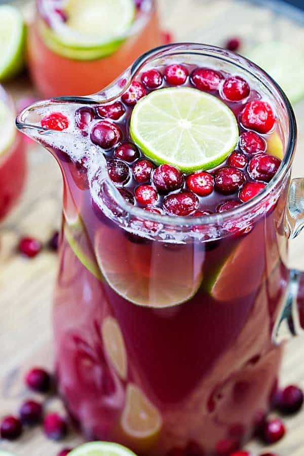 Cranberry Pineapple Punch is my new go to party cocktail. It can be made with or without alcohol and it's perfect for holiday parties!
