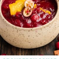 cranberry sauce with orange and cinnamon in a bowl with recipe name at the bottom