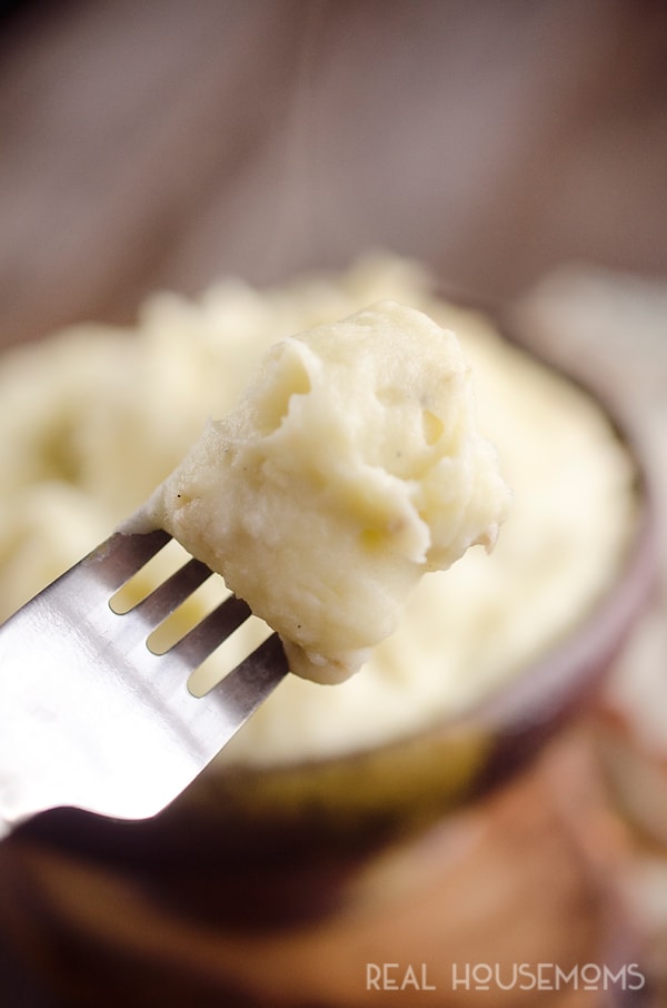 Cream Cheese Garlic Mashed Potatoes are a rich and hearty family favorite! This side dish is a delicious 3 ingredient recipe perfect for a holiday meal or a Sunday dinner!