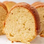 square image of a slice of cream cheese pound cake on a plate