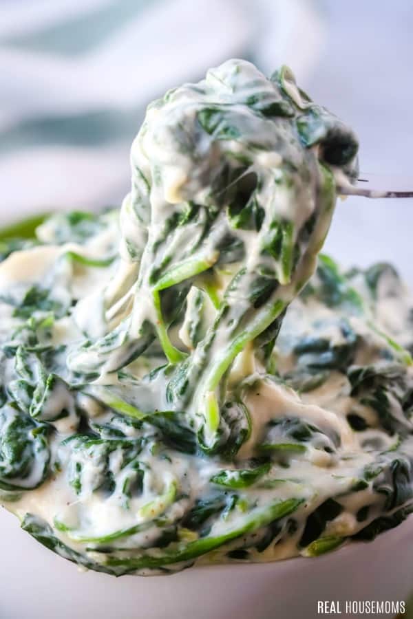 forkful of creamed spinach