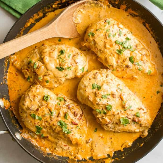 Creamy Chipotle Chicken is a simple but super flavorful 30-minute dinner with a delicious smoky chipotle cream sauce - that’s secretly healthy! Serve over rice to soak up the extra sauce!