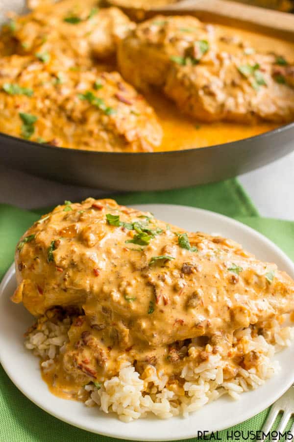 Creamy Chipotle Chicken served over rice on a plate