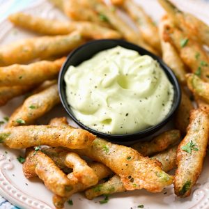 Now that we’re heading into Fall and football season, it’s time for all kinds of party foods. These Crispy Fried Green Beans with Wasabi Mayo are easy to whip up and they are always the first thing to get eaten at parties!
