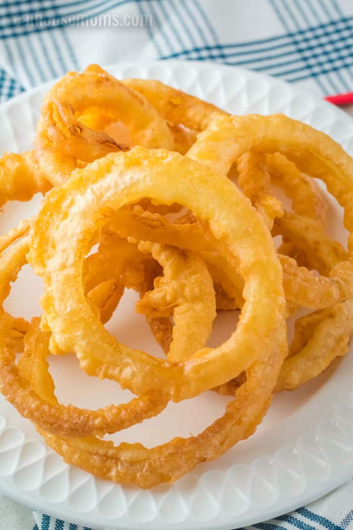 close up of onion rings on a plate