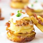 Crispy Loaded Potato Stacks - If you can slice and load potatoes with crispy bacon and shredded cheese than you can make these! They are perfect as a side dish or even for serving at a party!