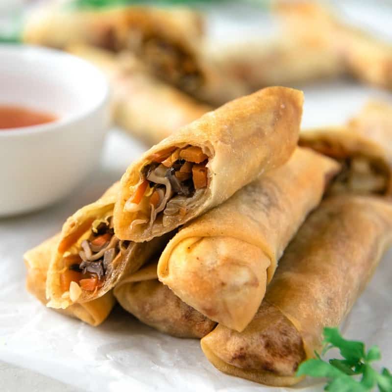 Better than takeout, these Crispy Spring Rolls are full of the flavors you love! Cabbage, carrots, and mushrooms come together in these traditional Vietnamese fried spring rolls, and are the perfect complement to any Asian dinner!