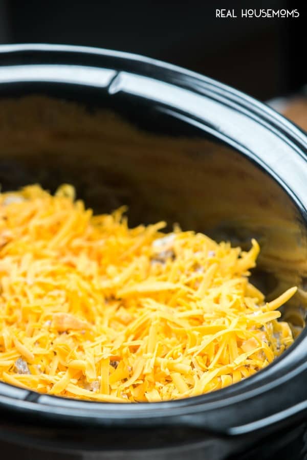 Bacon Cheeseburger Dip ready to be cooked in a slow cooker
