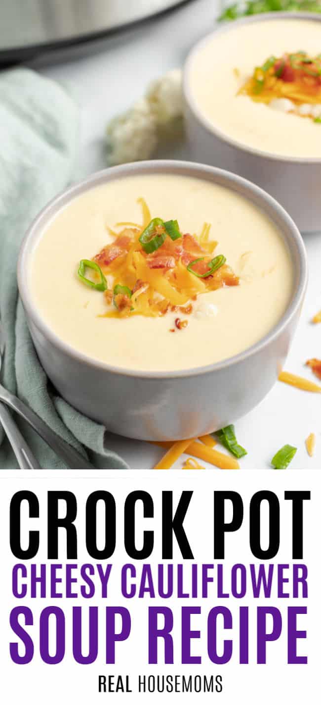 cheesy cauliflower soup served in a bowl topped with cheese, bacon, and chives