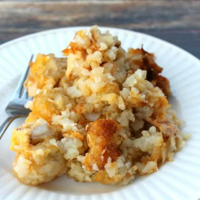 Crock Pot Cheesy Chicken, Bacon, & Tater Tot Bake is a delicious and super easy meal to put together. Your whole family will love it!