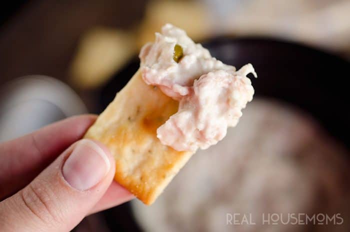 Crock Pot Cheesy Cuban Dip is an easy appetizer made in your slow cooker with all the great flavors of a Cuban sandwich including shredded pork, ham, and pickles!