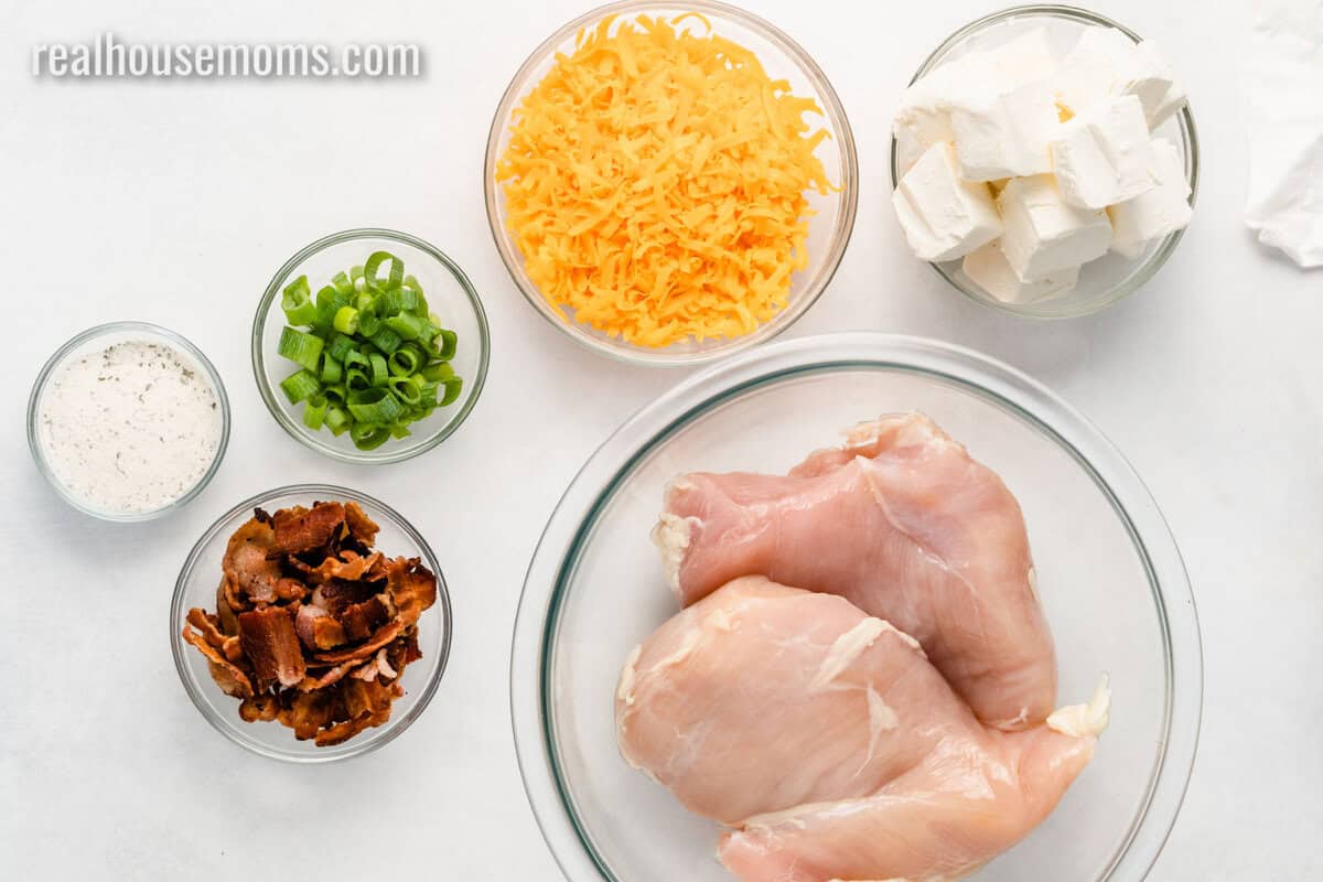 ingredients to make crack chicken in bowls on a counter