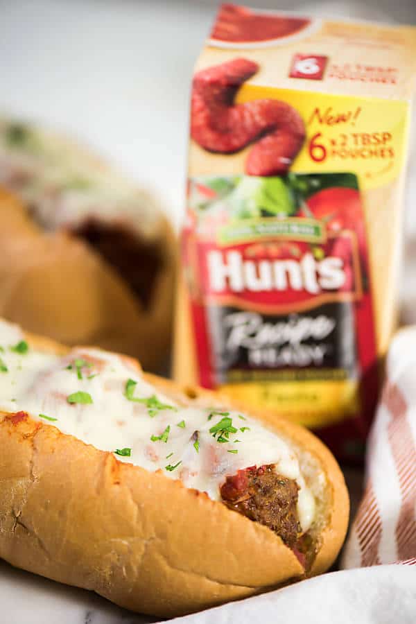 Crock Pot Meatball Sandwiches are classic tailgating food! They're an easy dinner recipe that tastes amazing! If you can make a hamburger you can make Crock Pot Meatball Sandwiches!