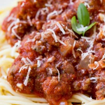 Crock Pot Spaghetti Sauce is an easy dinner recipe to make busy weeknights easier! I keep the ingredients on hand to make when I'll be short on time!