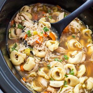 CROCK POT CHICKEN TORTELLINI SOUP is the easiest chicken noodle soup you will ever make! It's sure to become a fall and winter staple at your house!