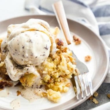 Crock Pot Crunchy Pecan Apple Cobbler is a warm and totally delicious apple cobbler that you make your slow cooker in no time at all! Just toss all the ingredients in and give it a couple hours!