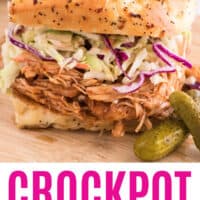 crockpot honey bbq chicken sandwich with coleslaw and pickles with recipe name at the bottom