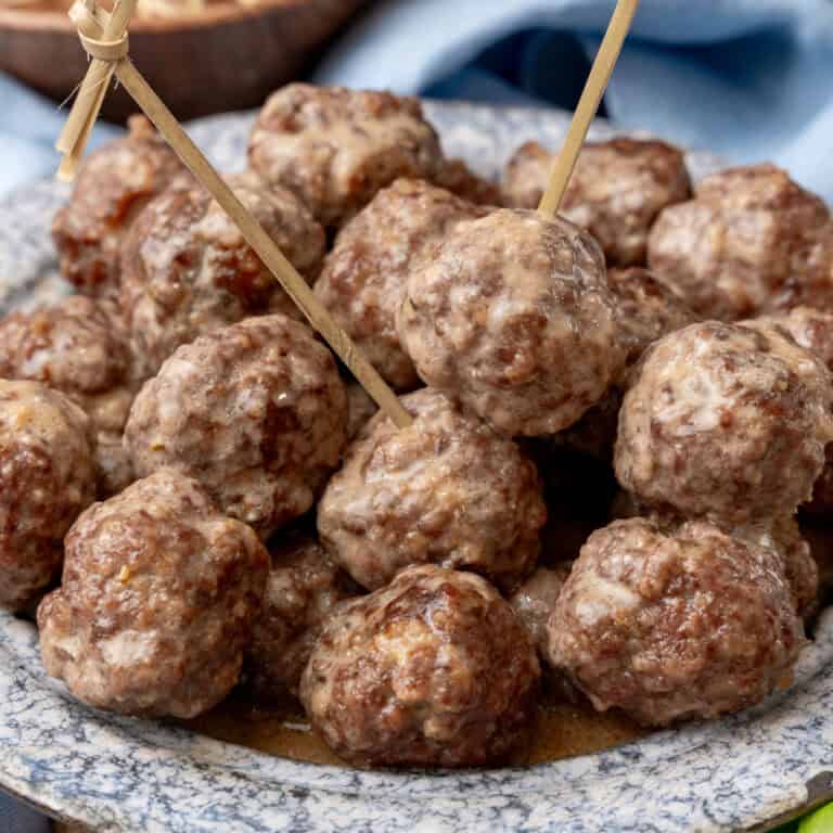 square image of crockpot swedish meatballs on a platter