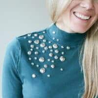This DIY Embellished Top is an easy way to dress up your favorite top and look stylish for all the holiday party season!