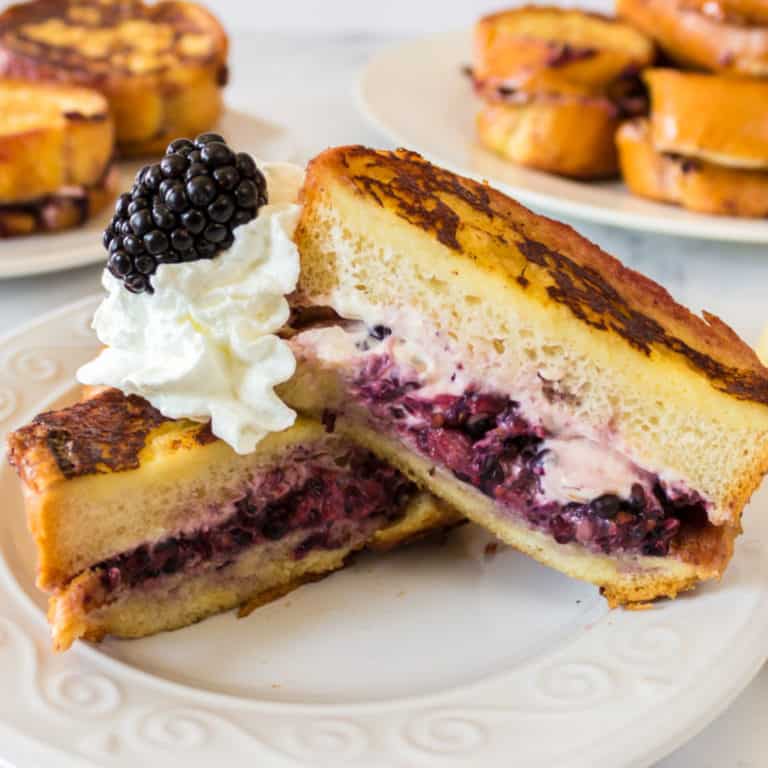 Oozing with sweet blackberries and melty cream cheese, Blackberries and Cream Stuffed French Toast is the perfect meal to make for someone special! It'll become your new family favorite!
