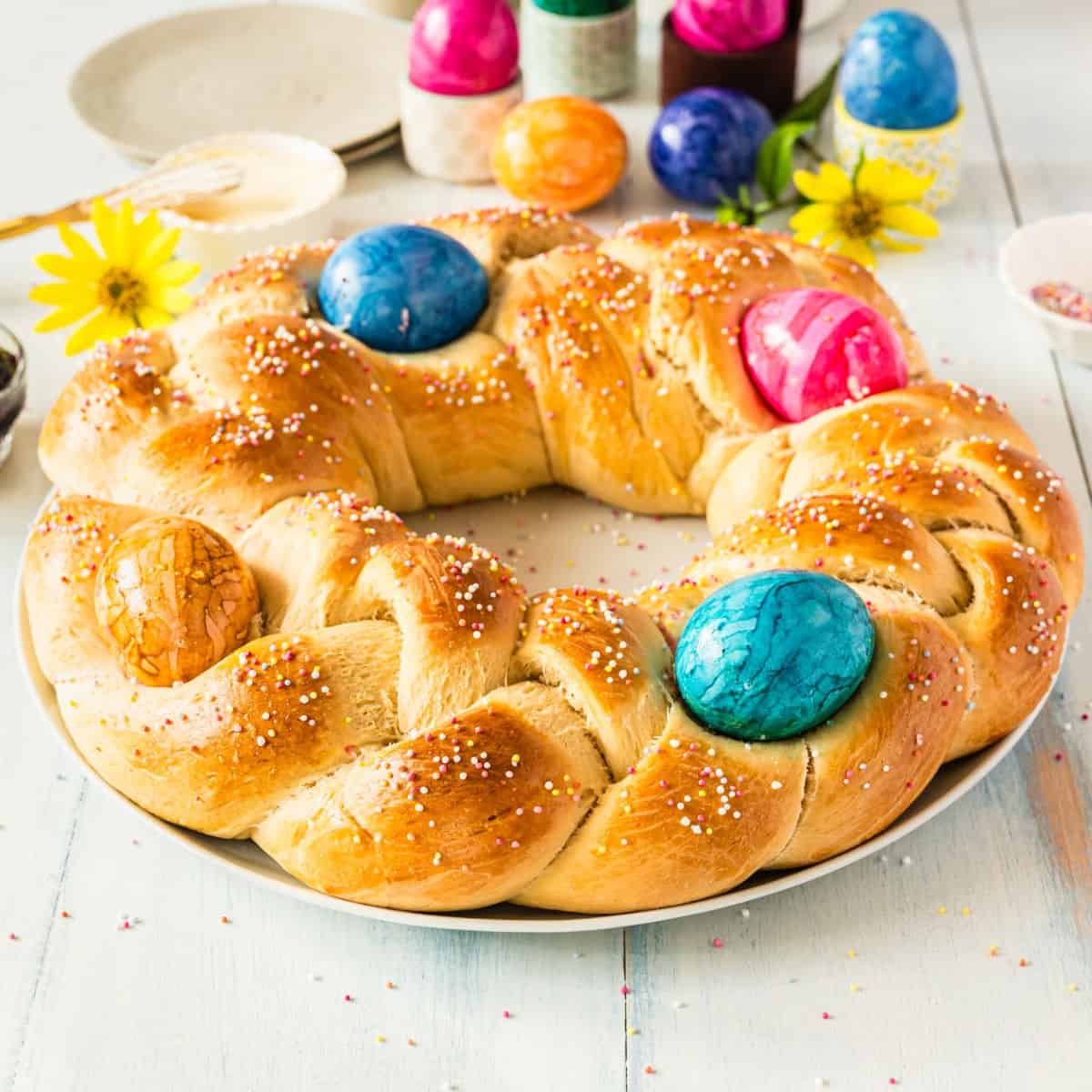 square image of easter bread on a serving plate