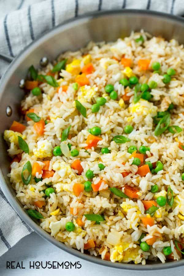 This Easy Fried Rice is a great reason to skip the take out! It's full of veggies and is WAY better than what you'd get at a restaurant!