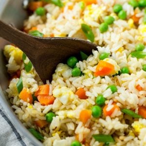 This Easy Fried Rice is a great reason to skip the take out! It's full of veggies and is WAY better than what you'd get at a restaurant!