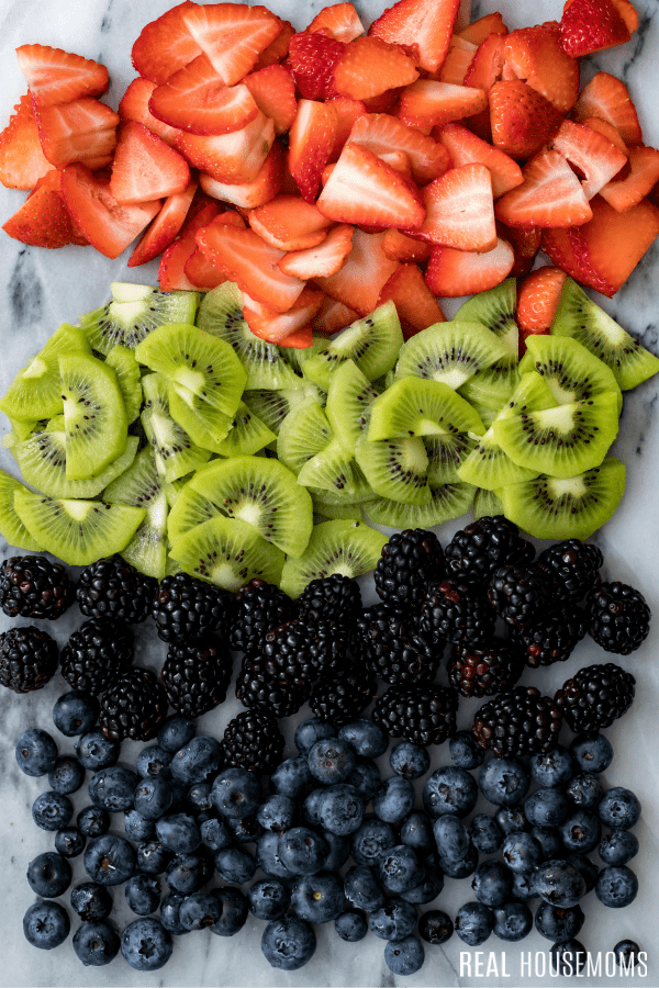 strawberry, kiwi, blackberries, and blueberries for fruit pizza