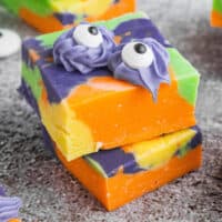 square image of two pieces of easy monster fudge stacked up