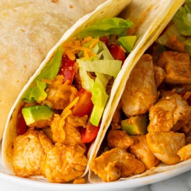 square image of easy ranch chicken tacos on a plate