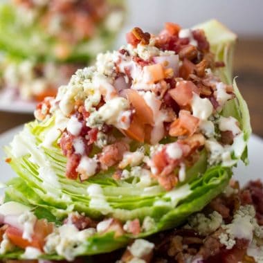 Easy Wedge Salad needs just a few fresh ingredients to make the perfect salad at home! Have it with soup for a light lunch or before your favorite meal!