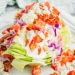 square image of a wedge salad on a plate