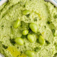 picture of edamame hummus in a blue bowl