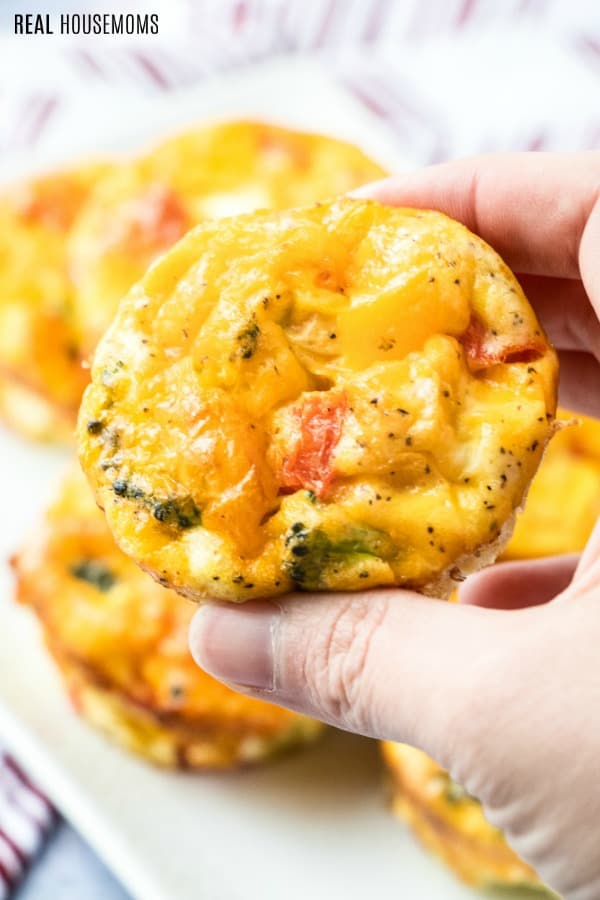 hand picking up a vegetable egg muffin