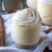 Creamy, crunchy and delicious these Eggnog Mousse Parfaits are set atop a graham cracker "crust" for a perfect single serving holiday treat!