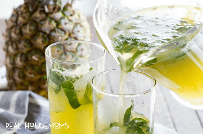 A refreshing PINEAPPLE LIMEADE made with a simple syrup, fresh basil, fresh lime juice, and plenty of pineapple. This is going to be your favorite mocktail ever!