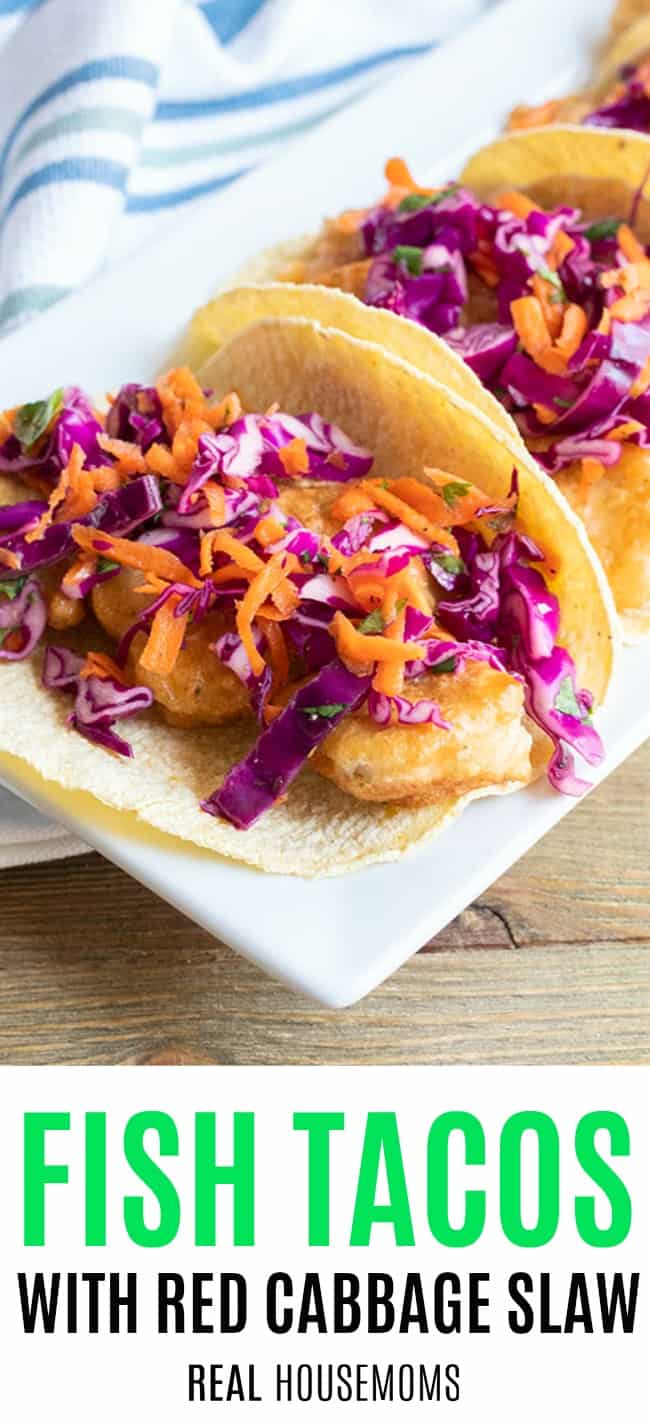 fish tacos with red cabbage slaw on a serving platter