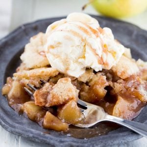 This French Apple Cobbler is delicious and comes together so fast! The baked apples are great with the vanilla baked topping and work perfectly with vanilla ice cream on top!