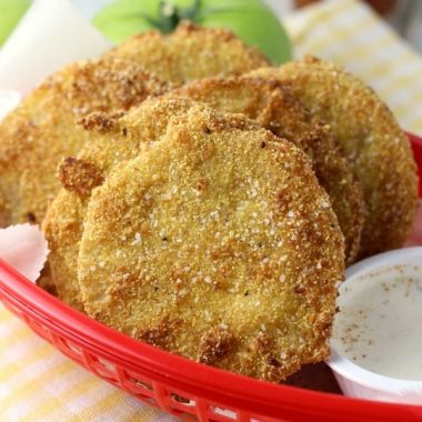 FRIED GREEN TOMATOES are a great way to use up the unripe tomatoes from your garden. Crispy, tart and oh-so-Southern they'll have you grabbing a glass of sweet tea and saying "ya'll" in no time!