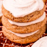 stack of frosted pumpkin snickerdoodles with recipe name at the bottom