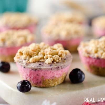 FROZEN BERRY CRUMBLE BITES are delicious bite-sized treat full of fresh berries mixed with creamy Cool Whip and topped with a crunchy pecan crumble!