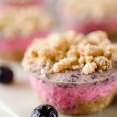 FROZEN BERRY CRUMBLE BITES are delicious bite-sized treat full of fresh berries mixed with creamy Cool Whip and topped with a crunchy pecan crumble!