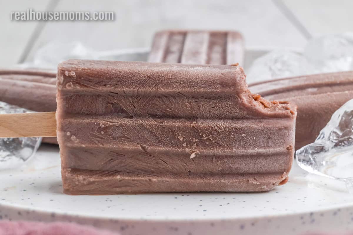 homemade fudgesicle with a bite taken out