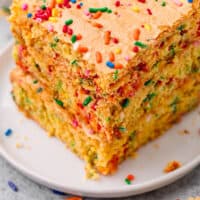 funfetti cake mix blondies staked on a plate with recipe name at the bottom