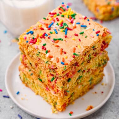 square image of a stack of 3 funfetti cake mix blondies on a plate