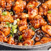 skillet of general tso's chicken with recipe name at the bottom