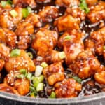 square image of general tso's chicken in a skillet